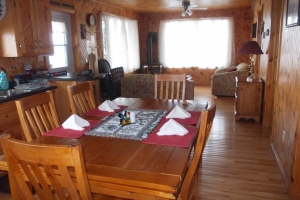 The cottages are all natural knotted pine inside.  All furnishings (inside and out), propane bar-b-qs, bedding, linens, dishes, glass wear, and pots and pans are included.  