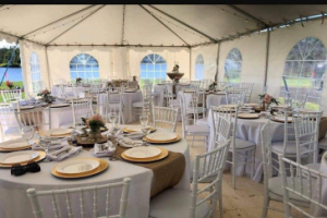 20x40 set up for a wedding. floor, tables and decor supplied by bride